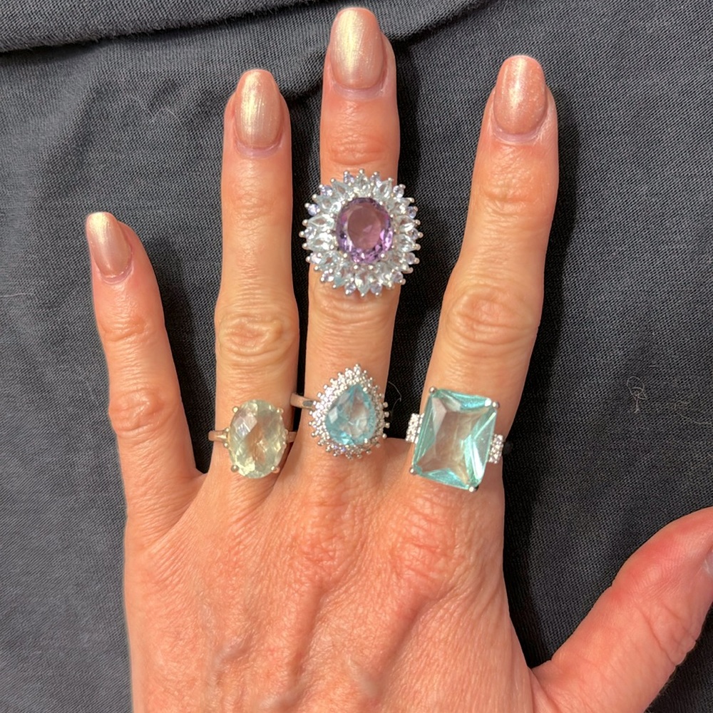 4 silver costume jewelry rings